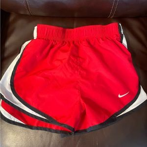 Red Nike women's tempo running shorts